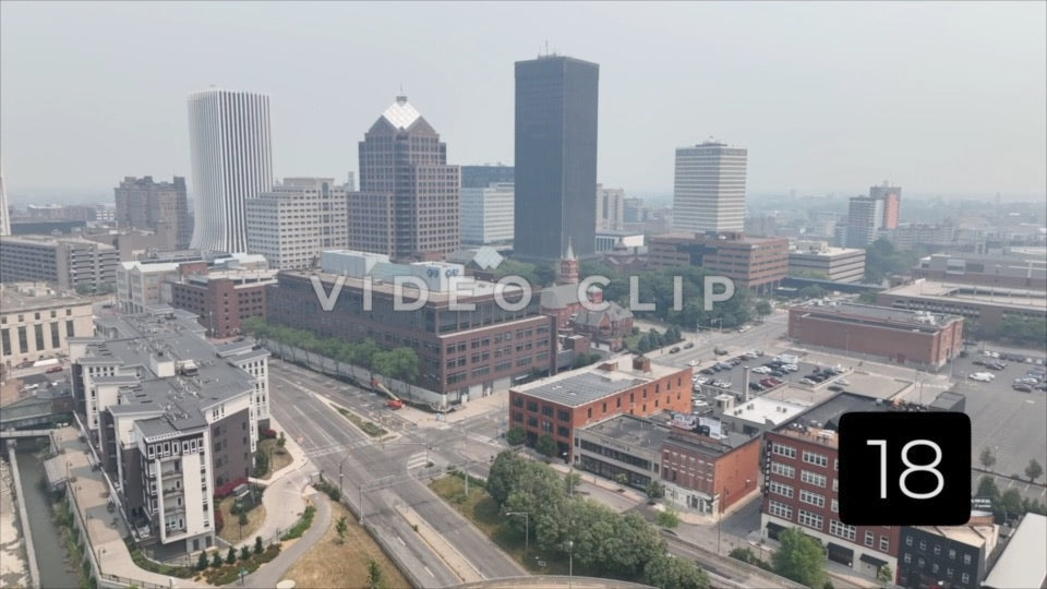 CLIP 18 - Rochester, NY Vol. 8 - Close aerial approach to downtown as Canadian wildfire smoke blows over