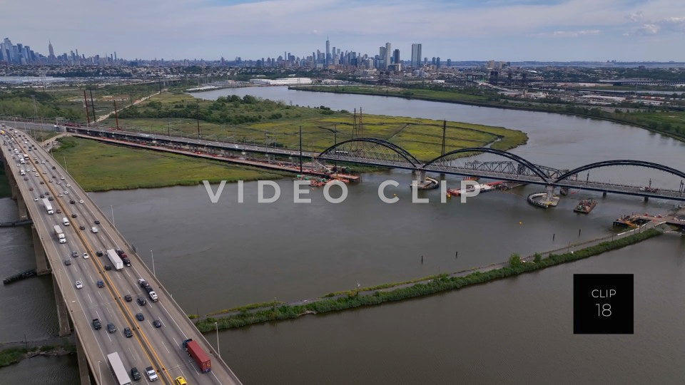 CLIP 18 - New York, NY Interstate 95 traffic crossing Hoboken River in New Jersey with NY skyline on horizon