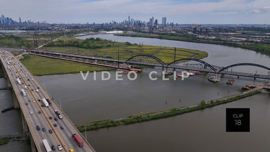 CLIP 18 - New York, NY Interstate 95 traffic crossing Hoboken River in New Jersey with NY skyline on horizon