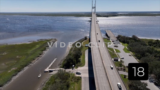 CLIP 18 - Brunswick, GA aerial turn while focusing in Sydney Lanier Bridge and boat landing