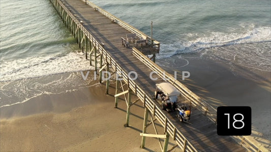 CLIP 18 - Pawleys Island, SC morning light as fisherman pass by on pier