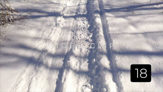 CLIP 18 - Winter Vol. 5 - Close up of snow mobile trail in public park
