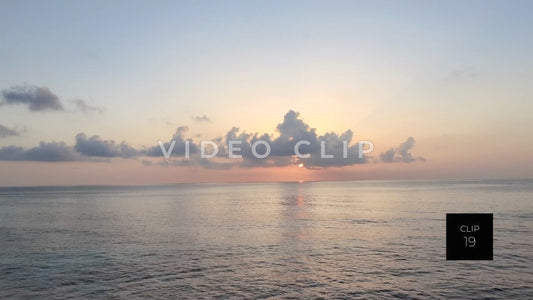CLIP 19 - Isla Mujeras, Mexico beautiful sunrise with clouds over peaceful Caribbean water