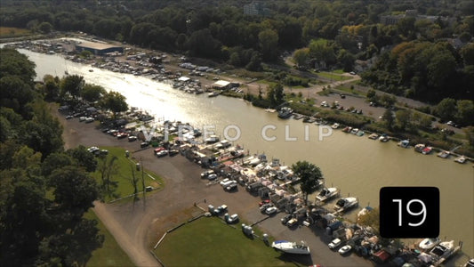 CLIP 19 - Rochester, NY Vol. 5 - Sunlight on boats along Genesee River at Marina