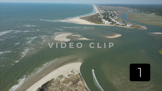 CLIP 1 - Pawleys Island, SC aerial of North Inlet with boat passing beneath