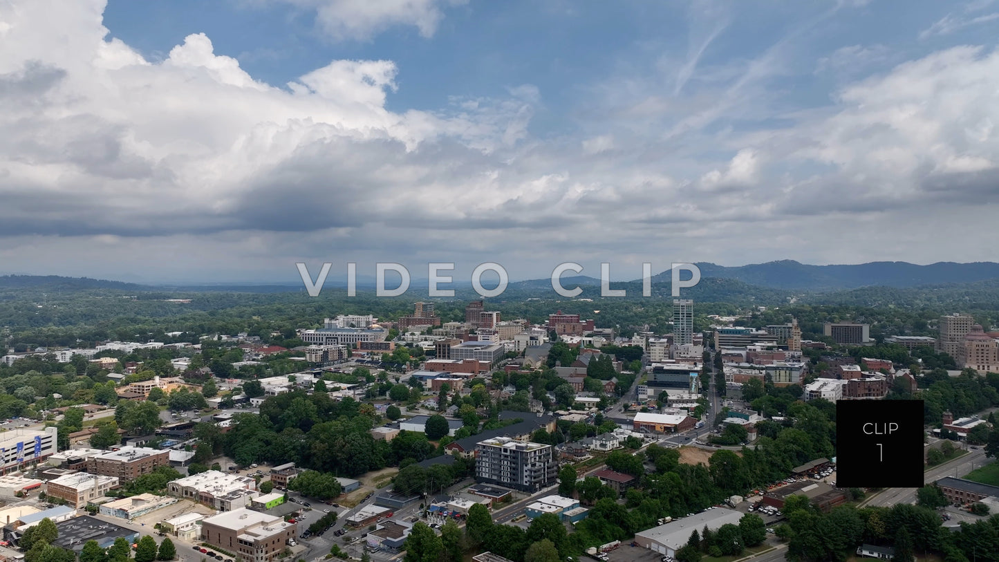 CLIP 1 - Asheville, NC rising above baseball field to reveal skyline