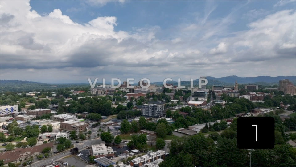 CLIP 1 - Asheville, NC rising above baseball field to reveal skyline