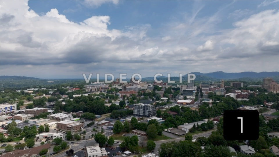 CLIP 1 - Asheville, NC rising above baseball field to reveal skyline
