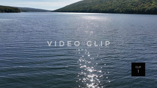 Stock video CLIP 1 - Canadice Lake, NY sparkling sunlight on peaceful New York Finger Lake 