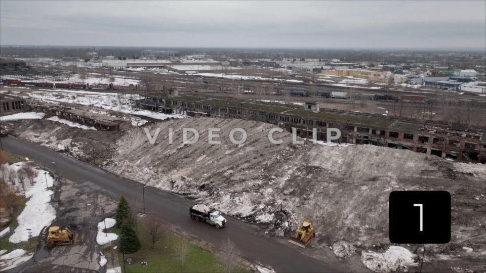 CLIP 1 - Buffalo, NY city workers truck snow to Central Terminal
