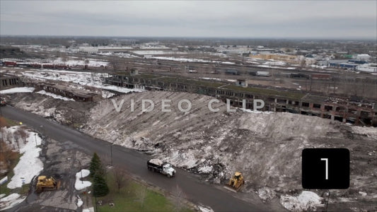 CLIP 1 - Buffalo, NY city workers truck snow to Central Terminal