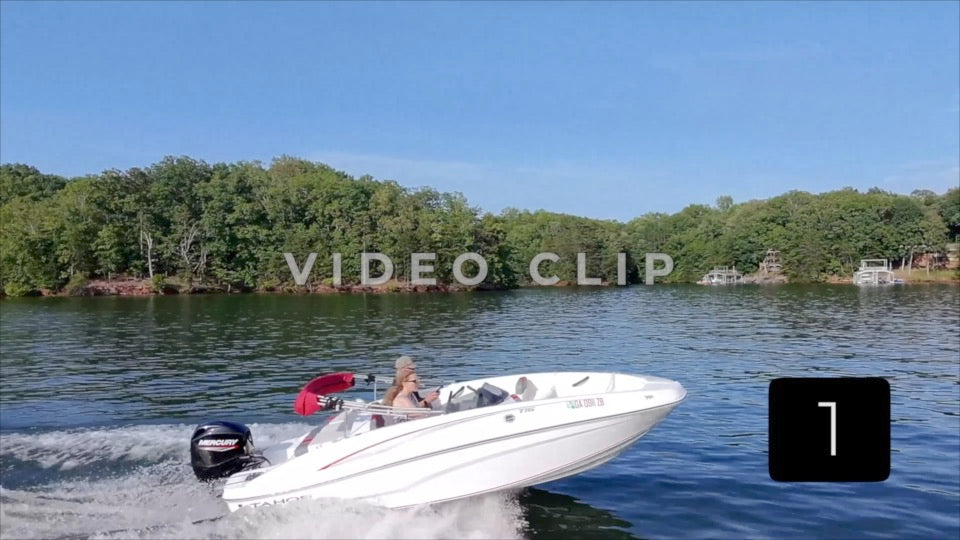 CLIP 1 - Lake Lanier, GA Couple in boat motors by camera