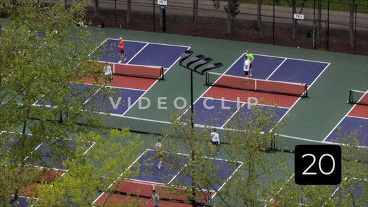 CLIP 20 - Cincinnati, Ohio people playing on Pickleball courts in public park downtown