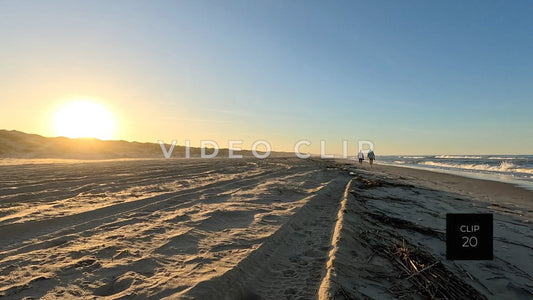 CLIP 20 - Outer Banks, NC couple walking on Cape Hatteras National Seashore at sunset