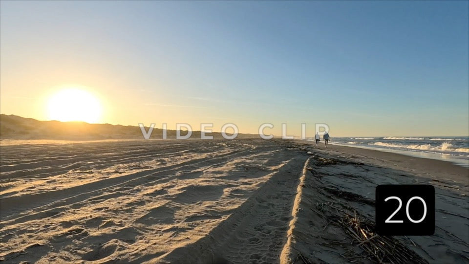 CLIP 20 - Outer Banks, NC couple walking on Cape Hatteras National Seashore at sunset