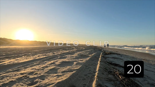 CLIP 20 - Outer Banks, NC couple walking on Cape Hatteras National Seashore at sunset