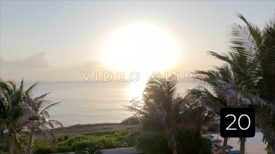 CLIP 20 - Isla Mujeras, Mexico slow flight through windows to sunrise over ocean