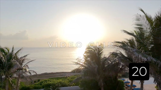 CLIP 20 - Isla Mujeras, Mexico slow flight through windows to sunrise over ocean