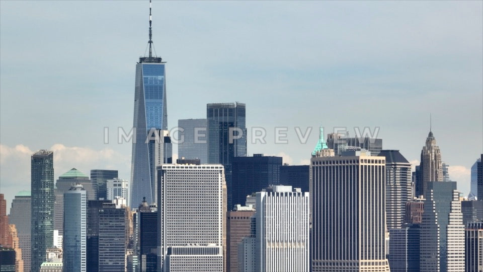 Photo - New York City, NY World Trade Center towering above office buildings in Manhattan