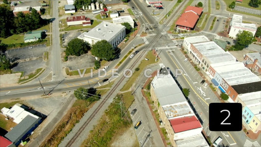 CLIP 2 - Montezuma, GA aerial flight over roads in small Southern town