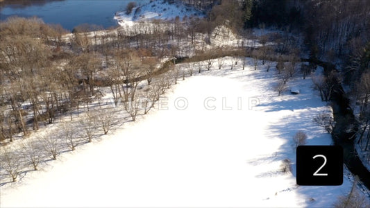 CLIP 2 - Rochester, NY Vol. 7 - Snow covered field in Winter in Ellison Park, NY with tree orchard