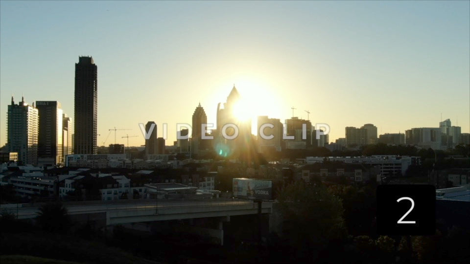 CLIP 2 - Atlanta, GA Vol. 1 - early morning sunshine behind city buildings in downtown