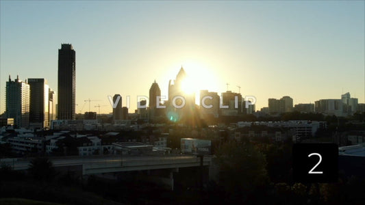 CLIP 2 - Atlanta, GA Vol. 1 - early morning sunshine behind city buildings in downtown