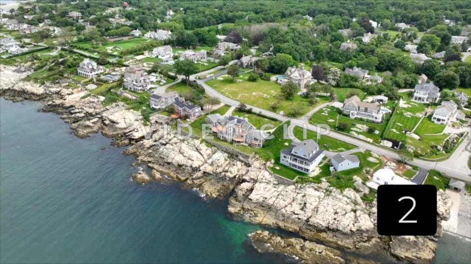 CLIP 2 - Boston, MA aerial of homes along the rocky coastline of Massachusetts Bay