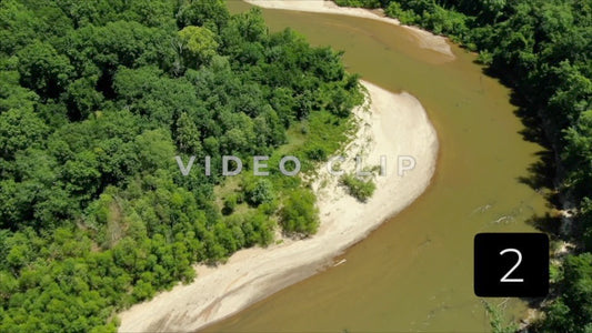 CLIP 2 - Flint River - low aerial flight over winding river through forest near Montezuma, GA