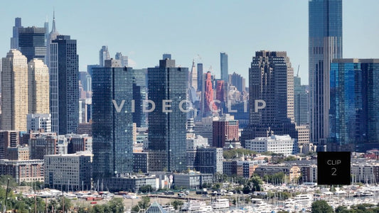 CLIP 2 - New York, NY Telephoto aerial of Jersey and New York City skyline office towers