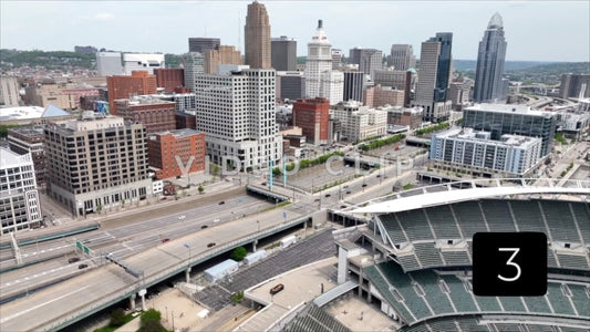 CLIP 3 - Cincinnati, Ohio passing over Paycor football Stadium towards downtown city skyline