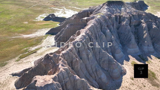 CLIP 3 - Badlands, SD dramatic flight towards Butte then lowering to far side