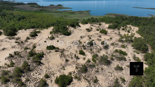 CLIP 3 - Outer Banks, NC aerial of natural sand dunes by inlet