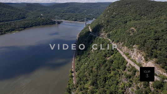 CLIP 3 - Hudson River, NY Bear Mountain Bridge with cars traveling on mountain road