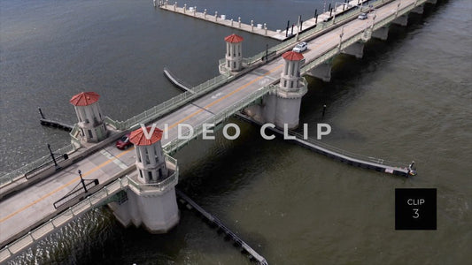 CLIP 3 - St Augustine, Florida dramatic turn over Bridge of Lions then rising up over inlet