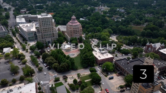 CLIP 3 - Asheville, NC city hall buildings then turning up to look at Blue Ridge Mountains