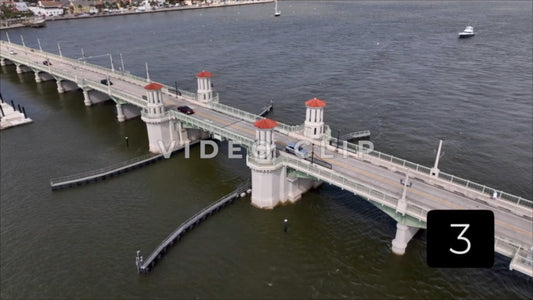 CLIP 3 - St Augustine, Florida dramatic turn over Bridge of Lions then rising up over inlet