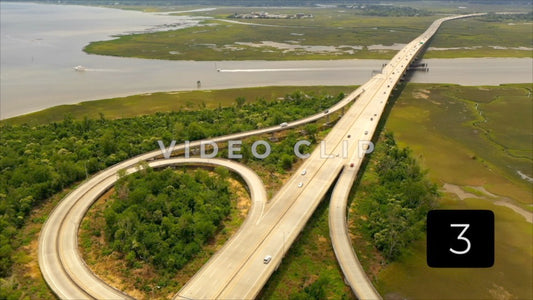 CLIP 3 - Charleston, SC highway with cars traveling over salt water marsh