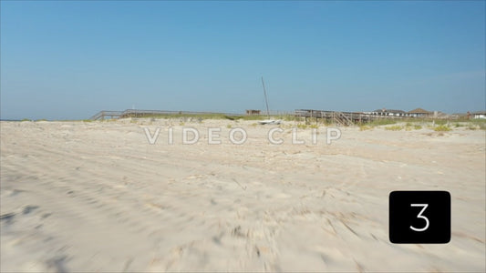 CLIP 3 - Pawleys Island, SC low flight over sand dunes and beach house boardwalks