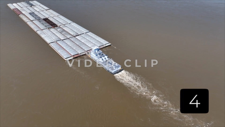 CLIP 4 - Memphis, TN Tug boat transports coal on barges up Mississippi River