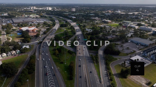 CLIP 4 - Jacksonville, FL looking down on interstate highway I-95 then tilting up towards horizon