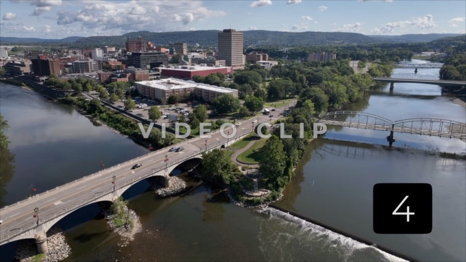 CLIP 4 - Binghamton, NY drone flight rising above rivers to view landscape with city