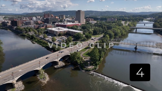 CLIP 4 - Binghamton, NY drone flight rising above rivers to view landscape with city