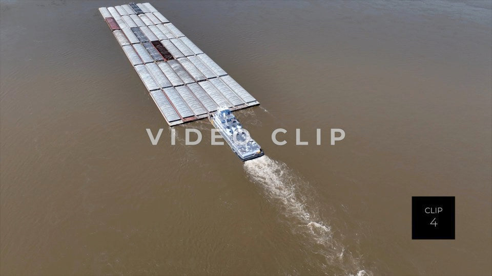 CLIP 4 - Memphis, TN Tug boat transports coal on barges up Mississippi River