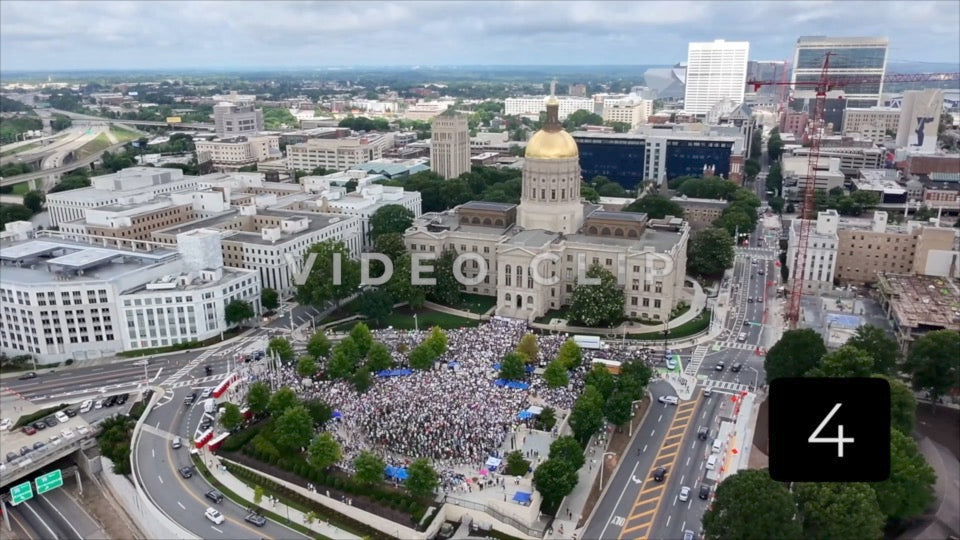 CLIP 4 - Atlanta, GA No Kings Protest - Aerial slow approach to crowd in front of Georgia State Capitol