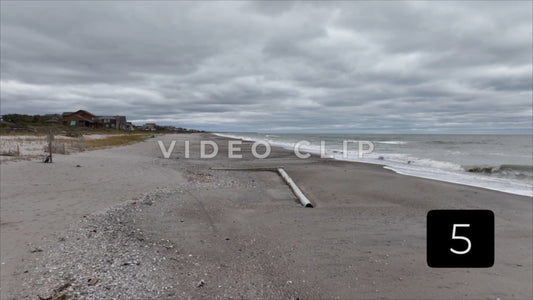 CLIP 5 - Pawleys Island, SC remains of fishing pier washed ashore after Hurricane Ian