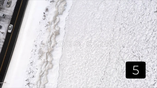 CLIP 5 - Winter Vol. 3 - Winter Lake Ontario looking down on frozen shoreline beside road