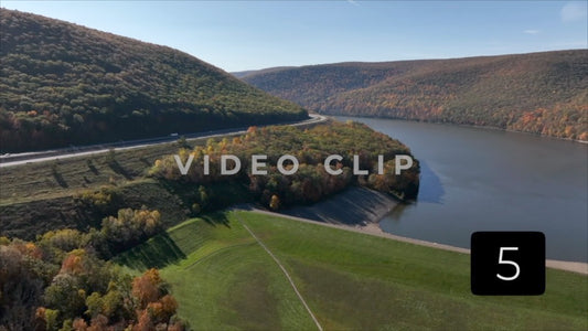CLIP 5 - Tioga Dam and Reservoir, PA passing over reservoir towards cars traveling on road