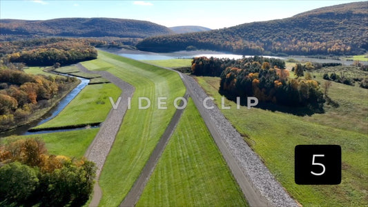 CLIP 5 - Tioga-Hammond Lakes, PA flying over green levee towards reservoir Dam