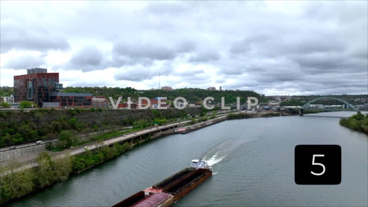 CLIP 5 - Pittsburgh, PA Vol. 2 - barges on river traveling into the city